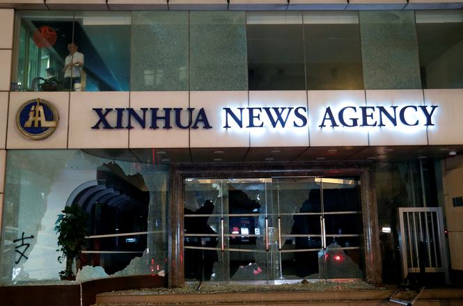 A U.S.-based reporter for the Xinhua News Agency had their visa revoked by the Trump administration on May 29, 2026. Above, Xinhua’s Hong Kong Bureau, damaged during 2019 protests.