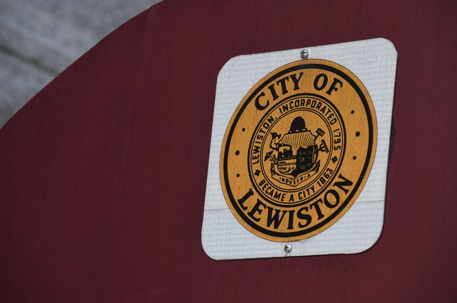 The city seal for Lewiston, Maine, displayed during a 2023 news conference at City Hall.