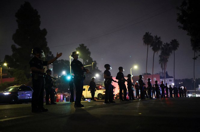 Police line up on a road in Los Angeles, California, on Nov. 1, 2025, after the LA Dodgers win the World Series.