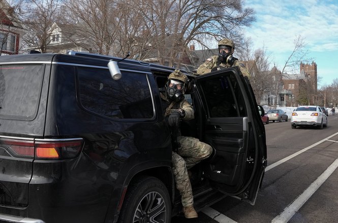 Federal agents deploy a tear gas canister after an immigration enforcement operation in Minneapolis, Minnesota, on Jan. 12, 2026. Photojournalist Tim Evans was shot at with pepper balls and exposed to chemical irritants while covering the protest.