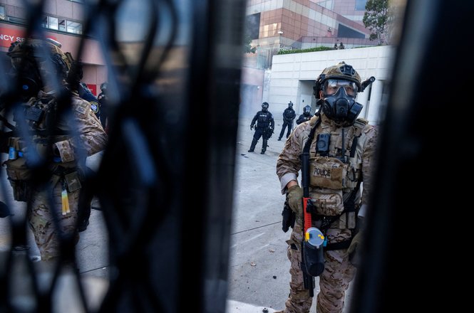 Federal officers at a protest outside a federal building March 28, 2026, in Los Angeles, California.