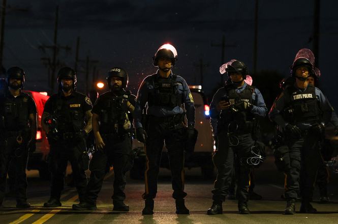 Officers during an immigration protest outside a detention facility in Newark, New Jersey, on May 31, 2026.