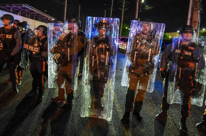 Police officers with riot shields outside an immigration detention facility in Newark, New Jersey, on May 31, 2026.