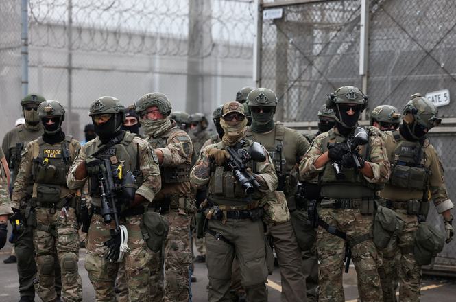 Federal law enforcement outside an immigration detention facility in Newark, New Jersey, on June 6, 2026.