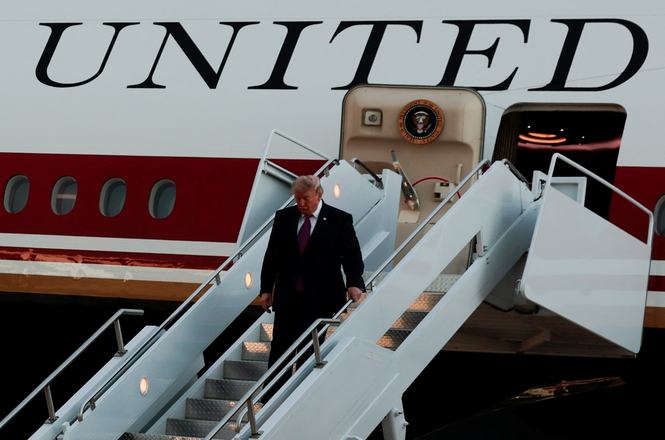 President Donald Trump deboards the new Air Force One, a plane gifted by Qatar, in South Dakota on July 3, 2026. Multiple New York Times reporters were subpoenaed July 10 by the Justice Department after reporting on safety concerns with the aircraft.