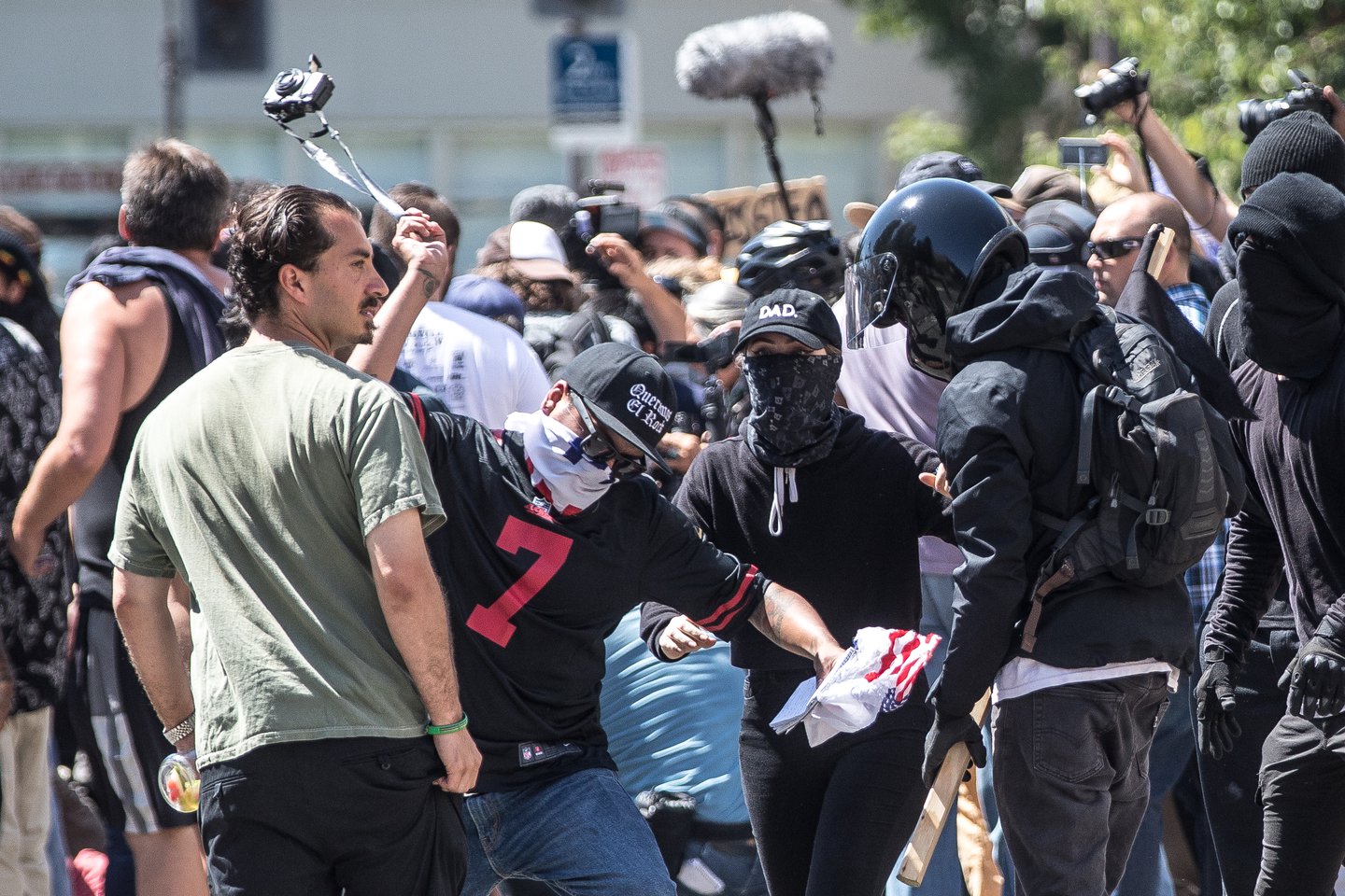 Protester about to smash Mike Kessler's camera at Berkeley