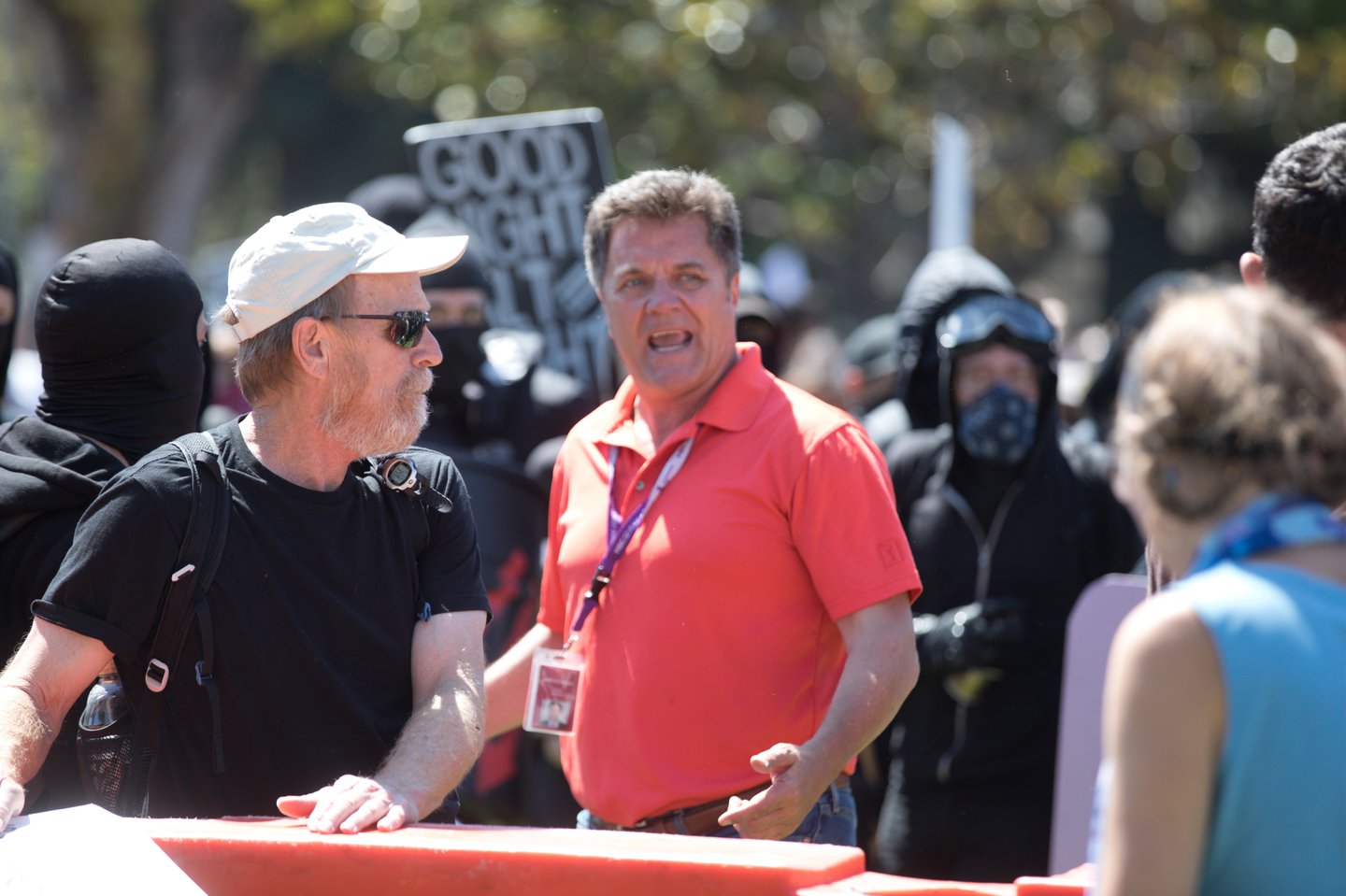 Thom Jensen argues with protesters