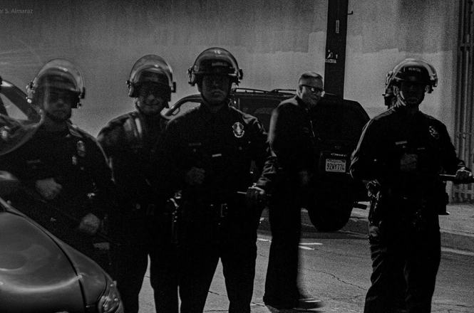 Members of the Los Angeles Police Department form a skirmish line during a “No Kings” protest on Oct. 17, 2026.