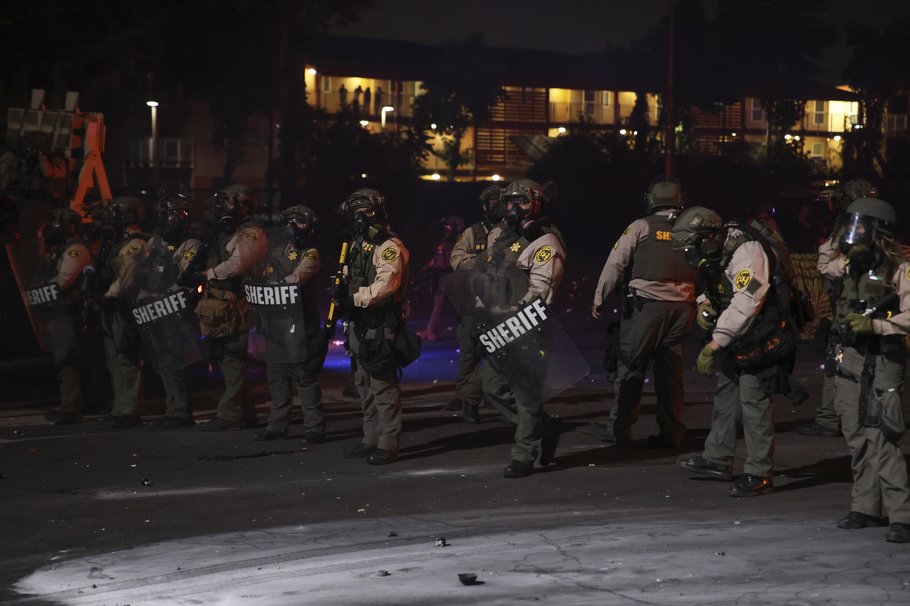 AP PHOTO / ETHAN SWOPE