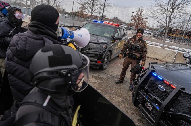 A Hennepin County sheriff’s deputy at a protest outside the Bishop Henry Whipple Federal Building in Fort Snelling, Minnesota, on Feb. 7, 2026.