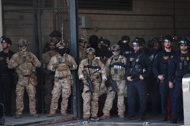 Federal agents outside an immigration detention center in Los Angeles, California, on June 6, 2026.