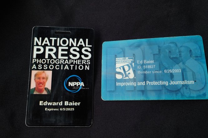 Press badges belonging to Edward Baier, who was arrested while filming police activity from a San Diego, California, freeway bridge on Nov. 27, 2023.