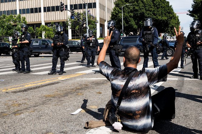 Los Angeles police respond to protests against the Trump administration and its immigration policies at LA’s City Hall on June 14, 2025. Freelance photojournalist Matthew Reamer was shot with a crowd-control munition and shoved while documenting that day.