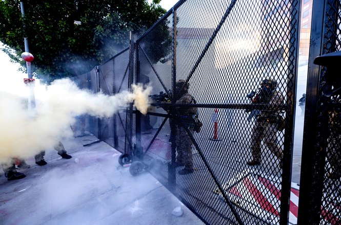 Federal agents fire chemical irritants into a crowd at a protest at an immigration detention center in Los Angeles, California, on March 28, 2026