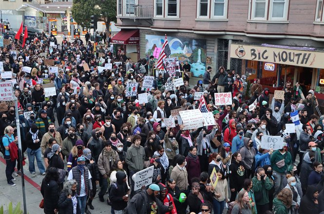 Protesters gather in San Francisco’s Mission District on June 9, 2025, rallying against recent federal immigration raids. Student journalist Sam Grotenstein was detained and shoved off a curb by police while covering the demonstration that night.