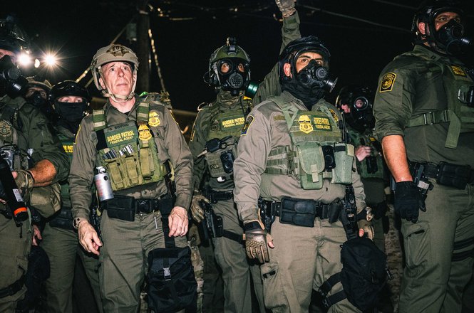 Federal officers respond to protests outside a U.S. Immigration and Customs Enforcement facility in Broadview, Illinois, on Sept. 27, 2025. WLS-TV photojournalist Jeff Freeman was shot with pepper balls when they advanced on the crowd.