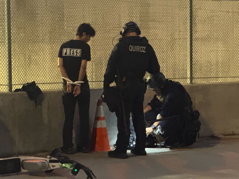 Journalist Neil Rivas is zip-tied during a "No Kings" demonstration in Los Angeles, California, on March 28, 2026.