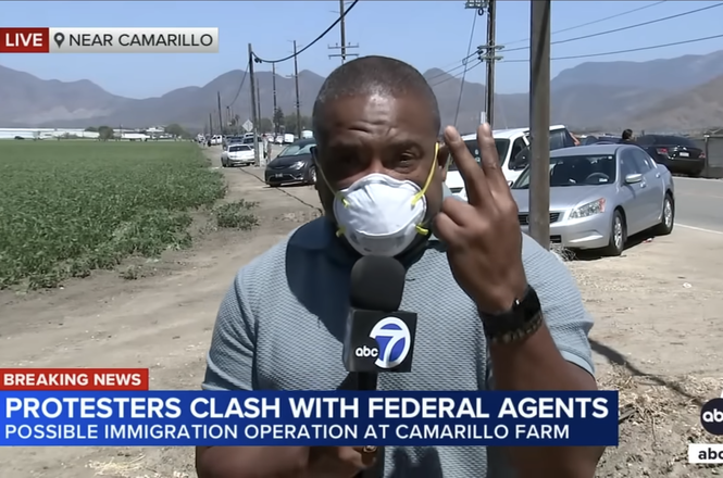 Leo Stallworth reporting live for KABC-TV following an immigration raid in Camarillo, California, on July 10, 2025. The photojournalist with him was shot twice with crowd-control munitions amid a standoff between demonstrators and federal officers.