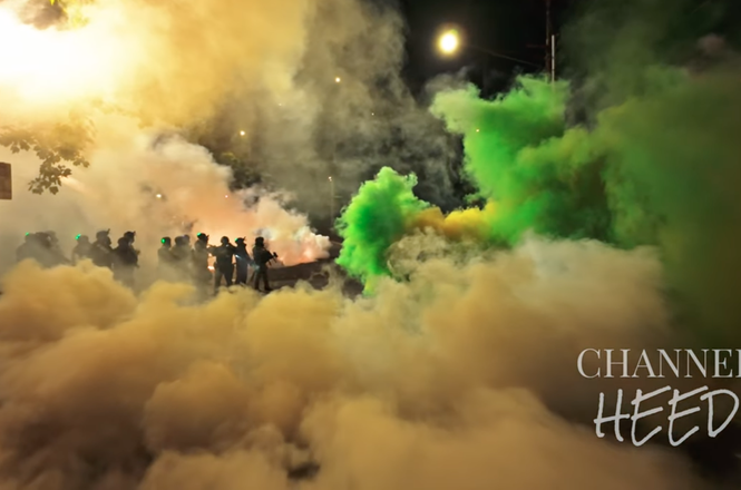Federal officers deploy tear gas during a protest outside an Immigration and Customs Enforcement facility in Portland, Oregon, on July 4, 2025
