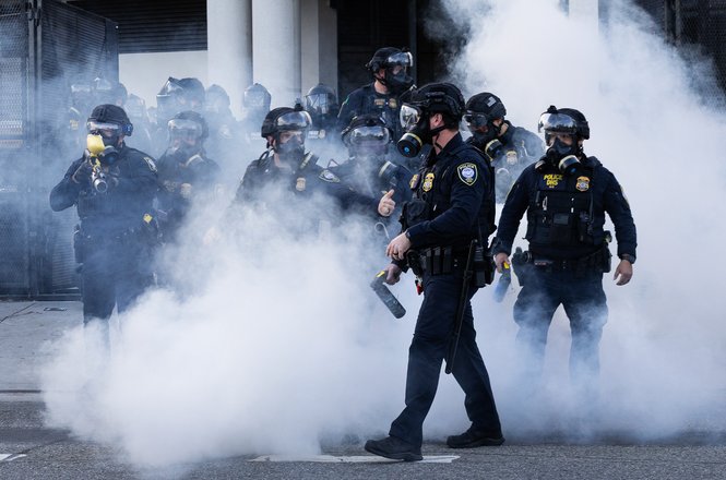 Federal officers amid tear gas at an immigration protest in Los Angeles, California, on March 28, 2026.