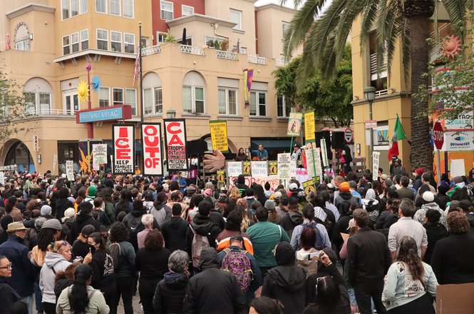Protesters rally against recent federal immigration raids in San Francisco’s Mission District on June 9, 2025. Student journalist Aarya Mukherjee was shot at with crowd-control munitions and detained by police while covering the demonstration that night.