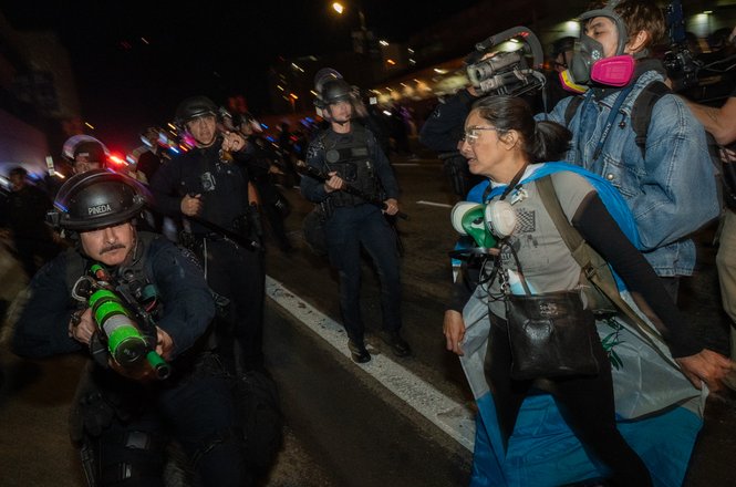 Law enforcement officers hold crowd-control weapons at an immigration protest in Los Angeles, California, on Jan. 30, 2026.