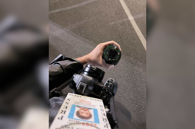 Mostafa Bassim, a photojournalist for Turkey’s Anadolu Agency, photographed his destroyed lens after a federal officer struck him with a baton while he was covering protests outside an immigration detention facility in Newark, New Jersey, on May 28, 2026.