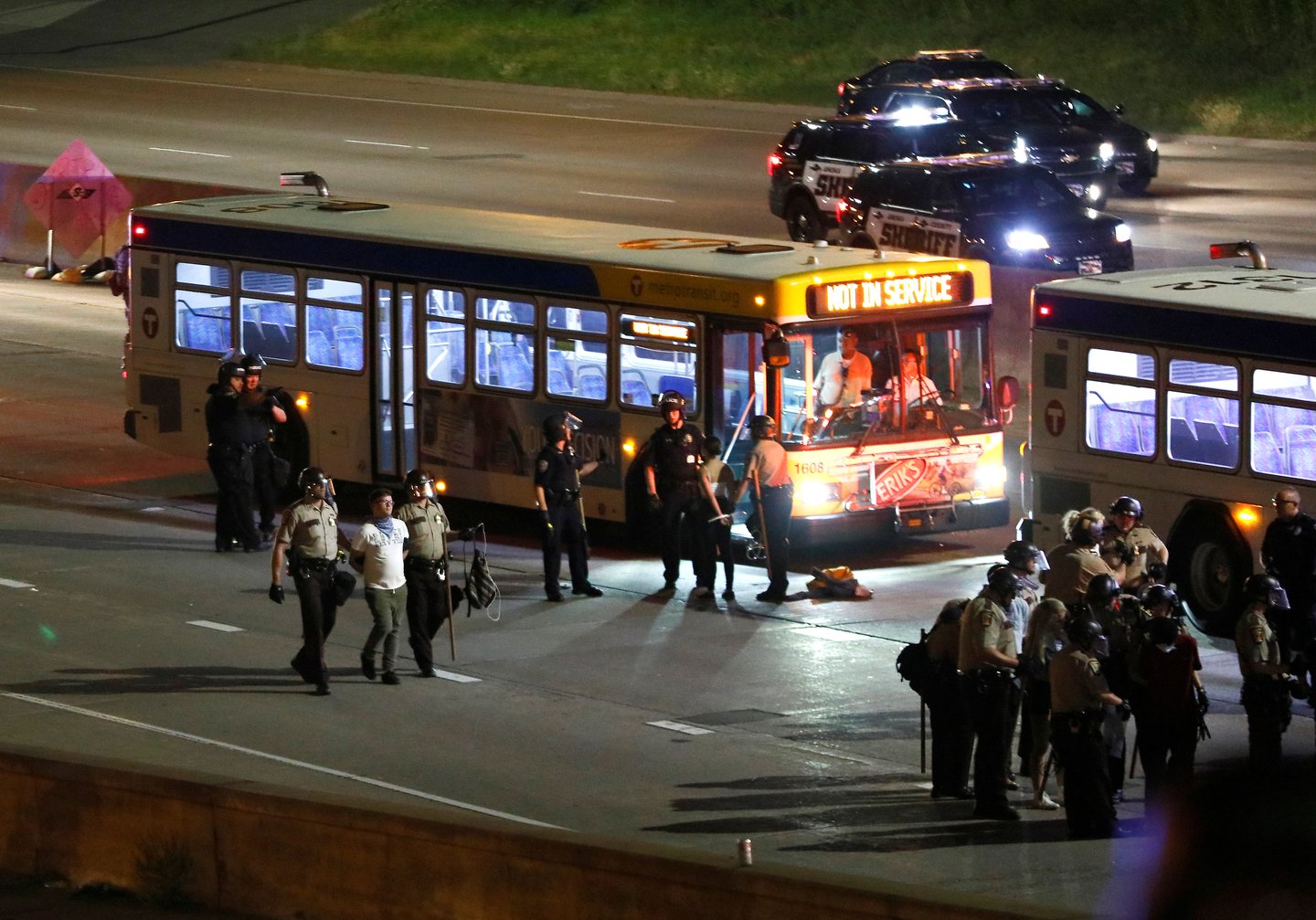 DATE IMPORTED:June 17, 2017Members of the Minnesota State Patrol arrest protesters during a gathering on Interstate 94 after a jury found St. Anthony Police Department officer Jeronimo Yanez not guilty of second-degree manslaughter in the death of Philand