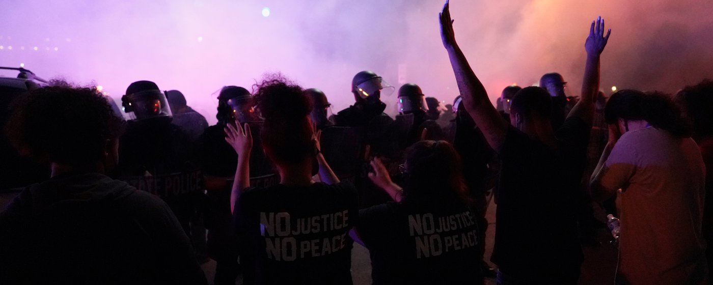 Tear gas is deployed into a Louisville, Kentucky, crowd on May 29, 2020.