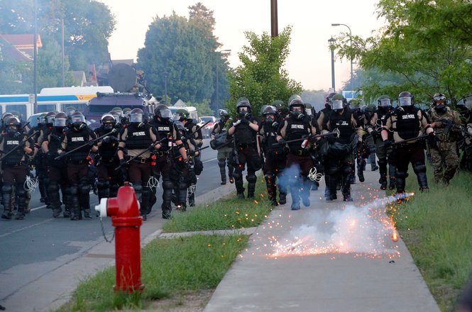 Minnesota State Patrol officers clear an area near the Minneapolis Police Department's Fifth Precinct on May 30, 2020. (REUTERS/ADAM BETTCHER) Freemark_Baran_assault_MN 0530_floyd.JPG
