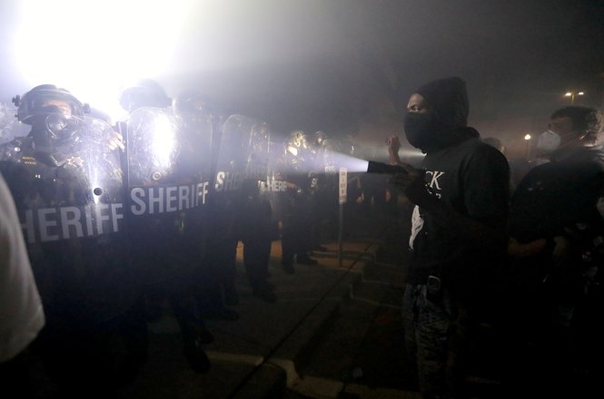 Protesters confront Kenosha County Sheriffs Deputies outside the Kenosha Police Department in Wisconsin following the police shooting of Jacob Blake, a Black man, on Aug. 23, 2020. (MILWAUKEE JOURNAL SENTINEL/MIKE DE SISTI) Jacob Blake_Kriesel