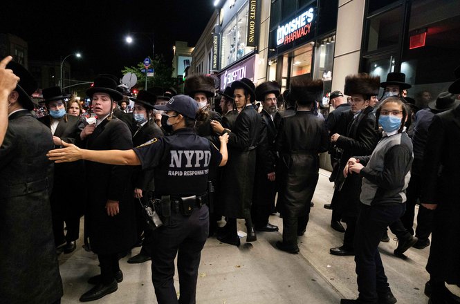 Protests erupted over new COVID-19 restrictions in areas with high infection rates, including this one in Brooklyn’s Borough Park on Oct. 7, 2020, where a reporter with Jewish Insider was assaulted by a crowd. (REUTERS/YUKI IWAMURA) Kornbluh_assault_1007_NY