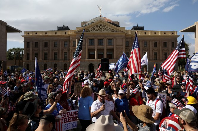 Supporters of President Donald Trump gather at a "Stop the Steal" protest in front of the Arizona State Capitol in Phoenix after the 2020 U.S. presidential election was called for Democratic candidate Joe Biden on Nov. 7, 2020. (REUTERS/JIM URQUHART) Ponders_AZ_assault_110720.JPG