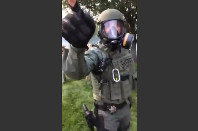 A screenshot from the livestream of Lincoln Journal Star reporter Chris Dunker of protests in Lincoln, Nebraska, on May 31, 2020. Dunker was detained by police while reporting. (SCREENSHOT VIA FACEBOOK) Floyd_arrest_NE.png
