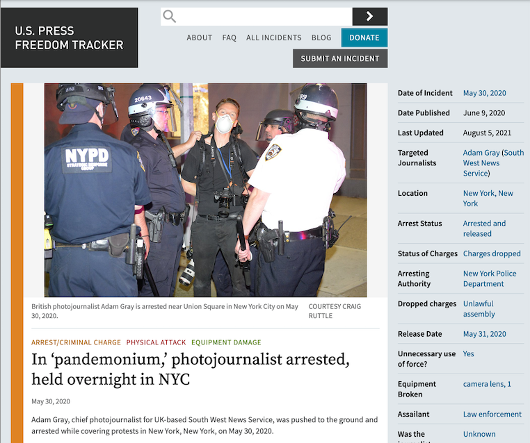 Photographer Gray arrested.png