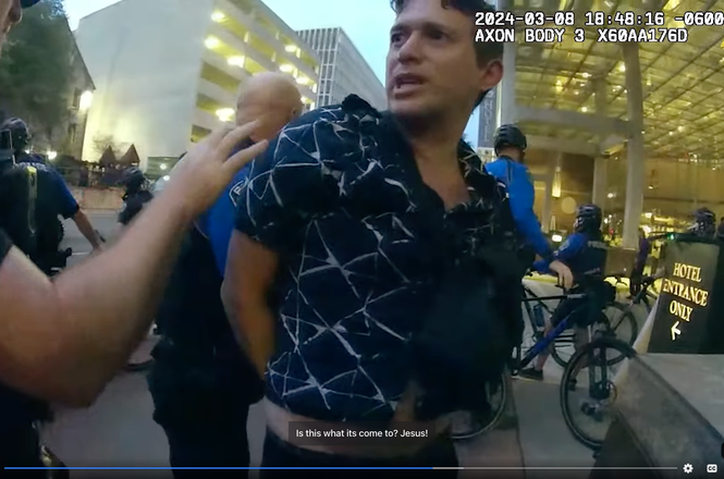 Independent journalist Jeff Zavala, center, moments after he was tackled to the ground and arrested by police while reporting on a protest at the South by Southwest festival in Austin, Texas, on March 8, 2024.