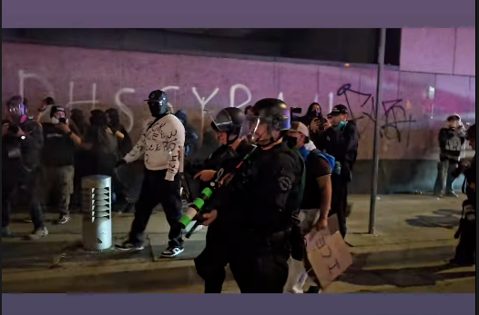 A Los Angeles Police Department officer holding a crowd-control weapon at an immigration protest in Los Angeles, California, on Jan. 30, 2026.