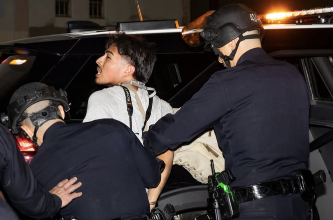 Independent photographer Angel Perez being arrested at a “No Kings” protest in Los Angeles, California, on Oct. 17, 2026.