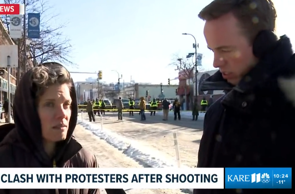 KARE anchor Jana Shortal, at left, tells reporter Joe McCoy about being pushed and targeted with a chemical irritant while covering the aftermath of a fatal shooting by Border Patrol agents in Minneapolis, Minnesota, on Jan. 24, 2026.