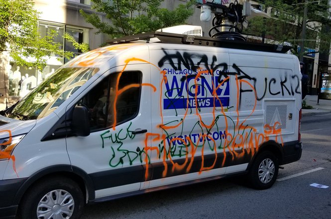 The WGN news van as seen on Michigan Avenue in Chicago on May 30, 2020. (MARK GUARINO VIA TWITTER) WGN_equip damage_0530_IL