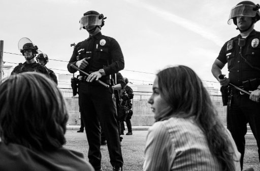 Police detain protesters and members of the press in a police kettle in Los Angeles, California, after a “No Kings” rally on March 28, 2026